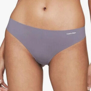 NWT Calvin Klein Women's Invisibles Seamless Thong Panty, purple haze, LARGE